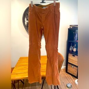 Free People pull on corduroy flare pants in a gold/brown